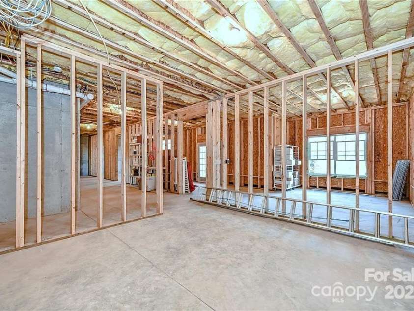 9810 Daufuskie Drive, Charlotte, NC 28278.  MLS# CAR4247189, YatesRealty ID 11486. Unfinished walk-out basement