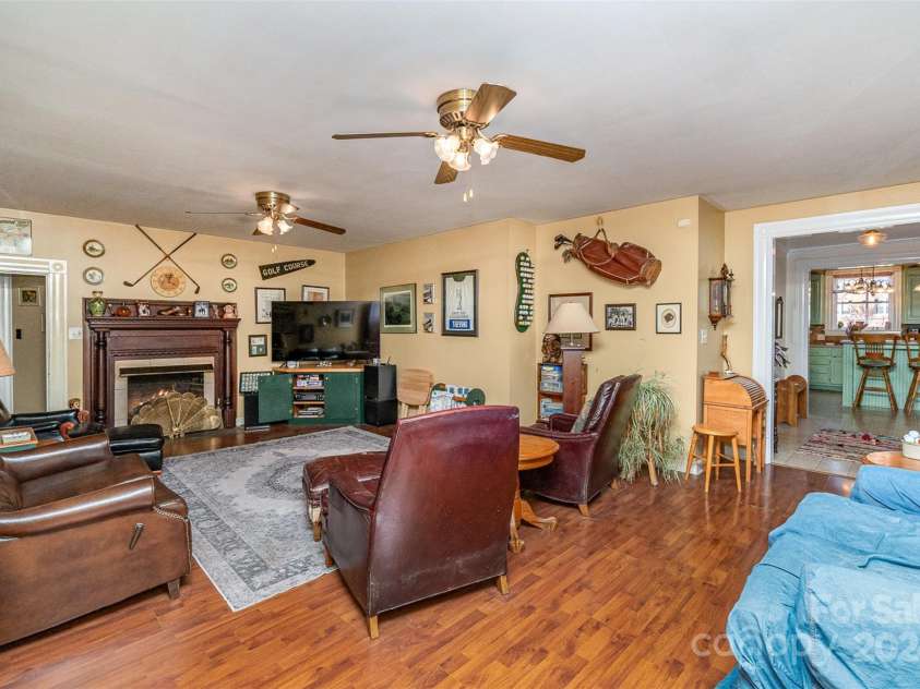 318 Elm Street, Marshville, NC 28103.  MLS# CAR4205783, YatesRealty ID 11490. Back Living Room