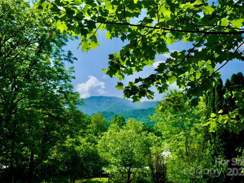 38 Buchanan Hill Road, Bakersville, NC 28705.  MLS# CAR4237916, YatesRealty ID 11490. 