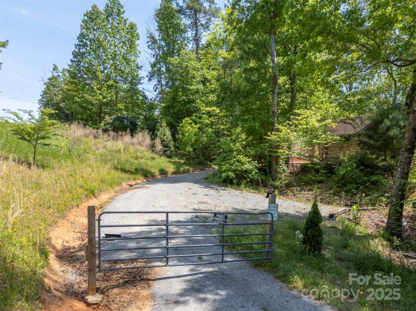 84 Bishop Lane, Mill Spring, NC 28756.  MLS# CAR4253625, YatesRealty ID 11496. 