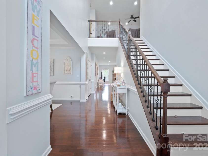 13115 Union Square Drive, Huntersville, NC 28078.  MLS# CAR4247415, YatesRealty ID 11499. Commanding foyer is two story and has nice railing