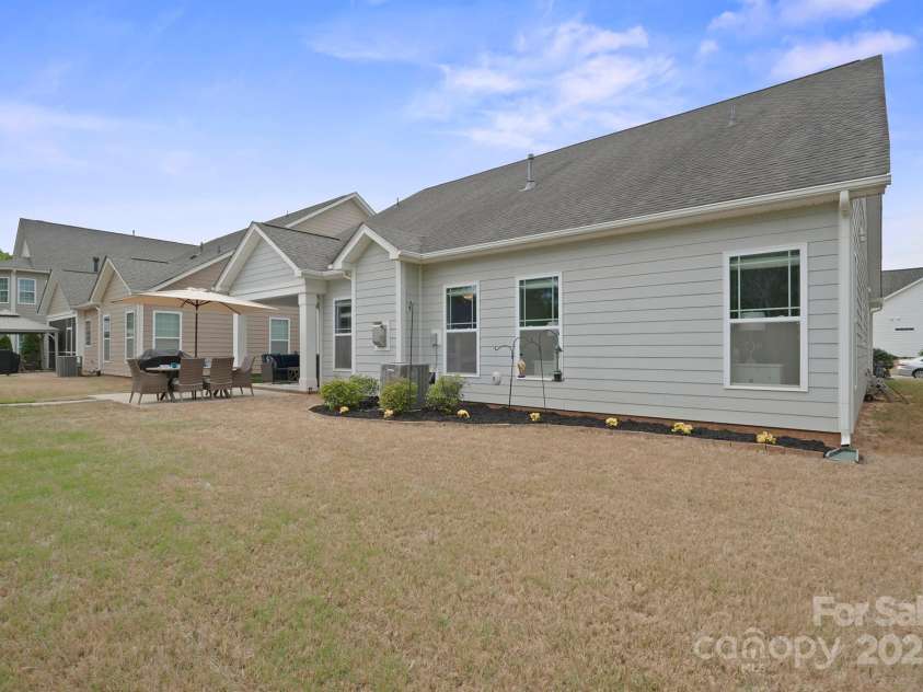 13115 Union Square Drive, Huntersville, NC 28078.  MLS# CAR4247415, YatesRealty ID 11499. Dont forget what a level lot you have on this home
