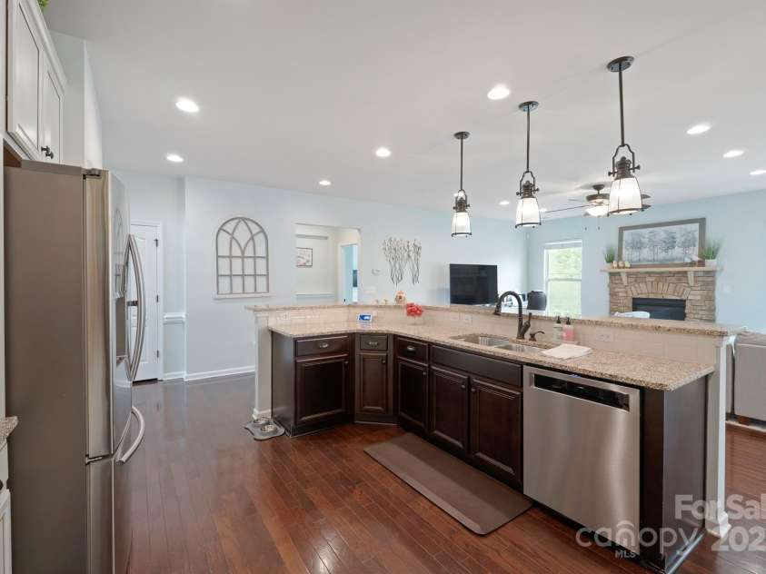 13115 Union Square Drive, Huntersville, NC 28078.  MLS# CAR4247415, YatesRealty ID 11499. Island host the sink and dishwasher