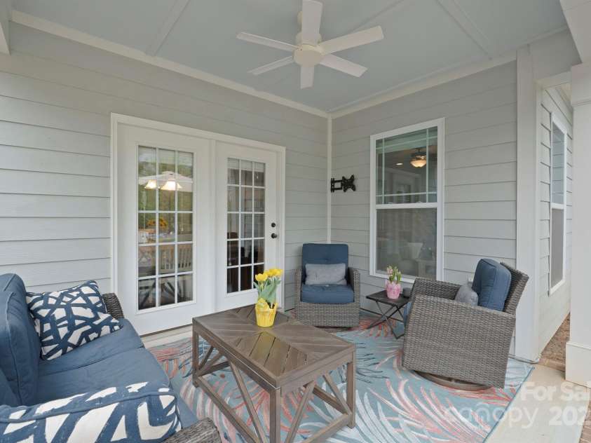 13115 Union Square Drive, Huntersville, NC 28078.  MLS# CAR4247415, YatesRealty ID 11499. Just off your eat in kitchen area is this relaxing back porch