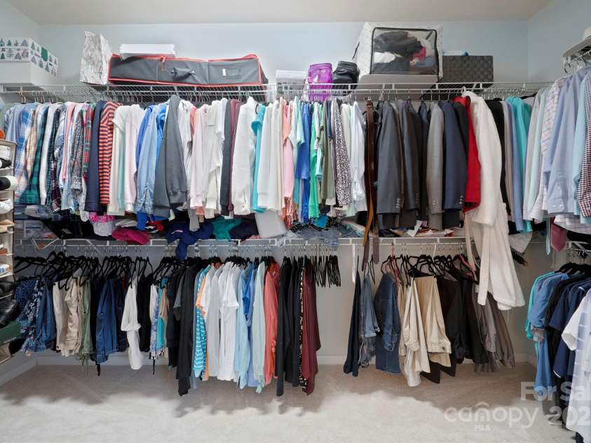 13115 Union Square Drive, Huntersville, NC 28078.  MLS# CAR4247415, YatesRealty ID 11499. Large Walk in closet for the primary