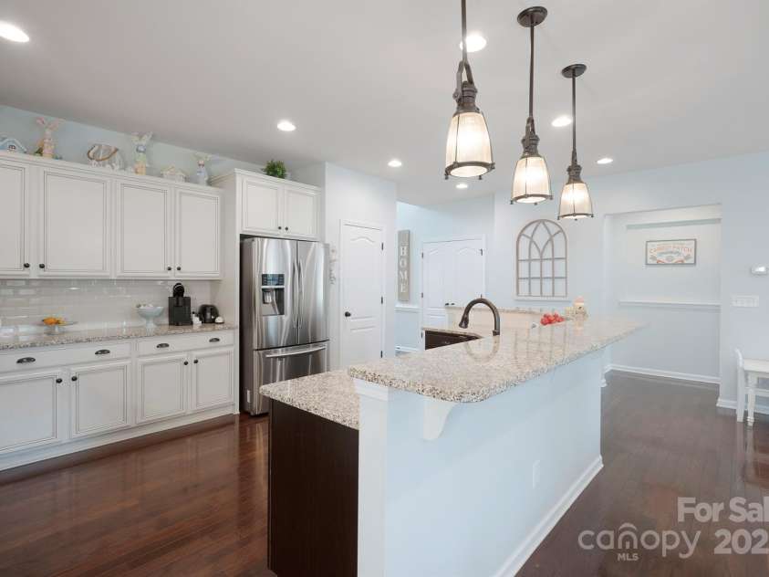13115 Union Square Drive, Huntersville, NC 28078.  MLS# CAR4247415, YatesRealty ID 11499. Ready for barstools if you would want more seating