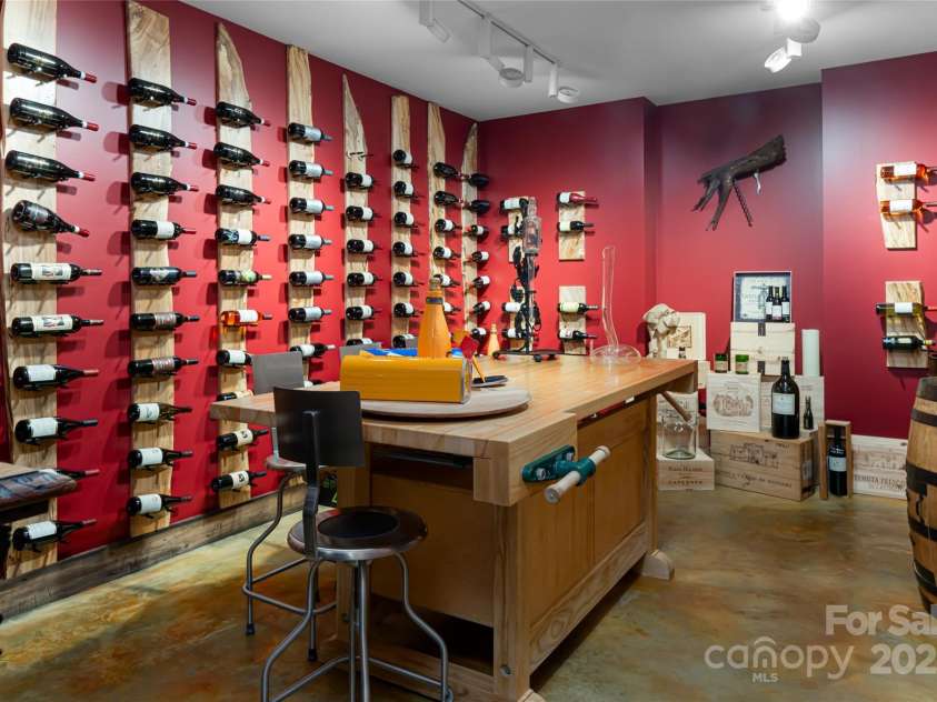57 Old Hickory Trail, Hendersonville, NC 28739.  MLS# CAR4150896, YatesRealty ID 115. A fully climate controlled wine room