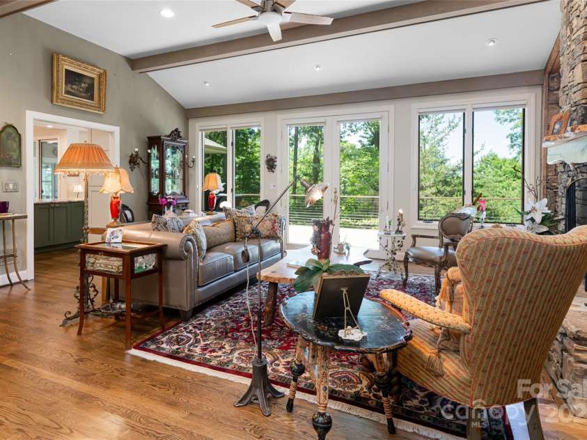 57 Old Hickory Trail, Hendersonville, NC 28739.  MLS# CAR4150896, YatesRealty ID 115. Beaming hardwood floors are found throughout the main level