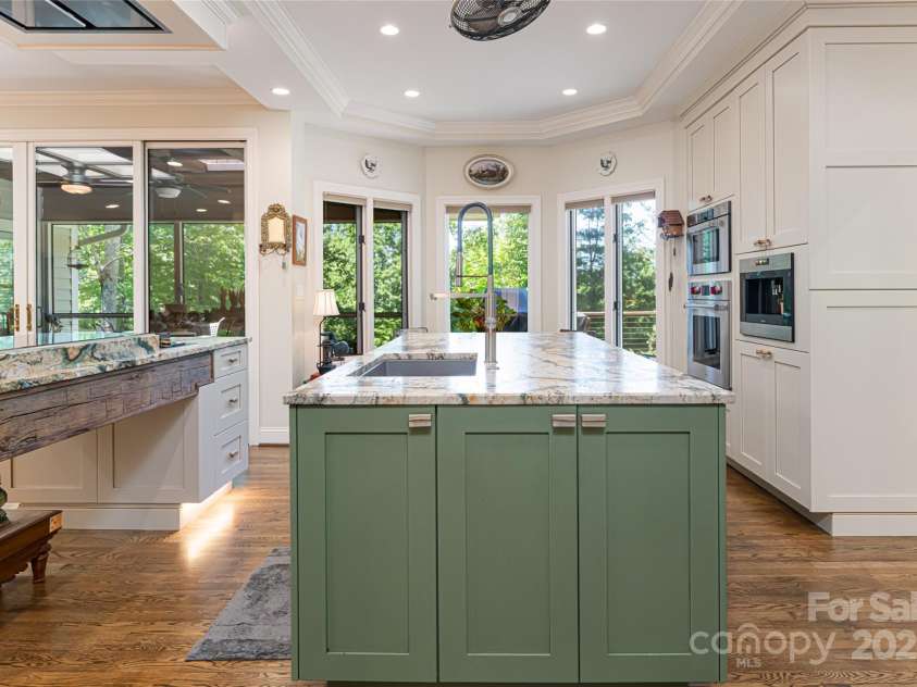 57 Old Hickory Trail, Hendersonville, NC 28739.  MLS# CAR4150896, YatesRealty ID 115. Completely renovated kitchen with Wolf and Sub-Zero Appliance Suite