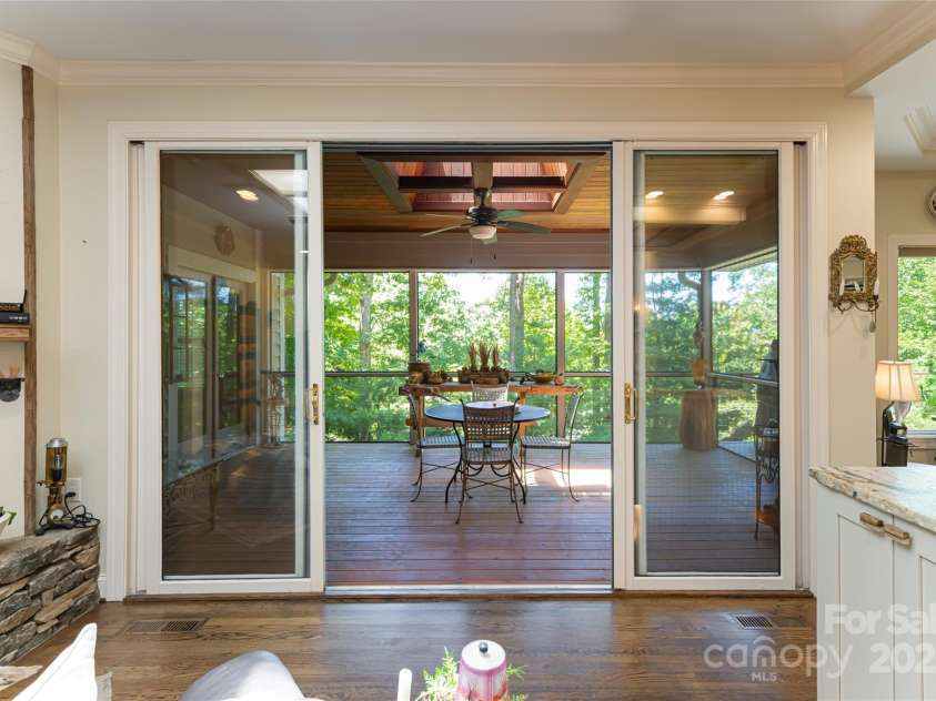 57 Old Hickory Trail, Hendersonville, NC 28739.  MLS# CAR4150896, YatesRealty ID 115. Effortless indoor/outdoor living with easy access to the screen porch