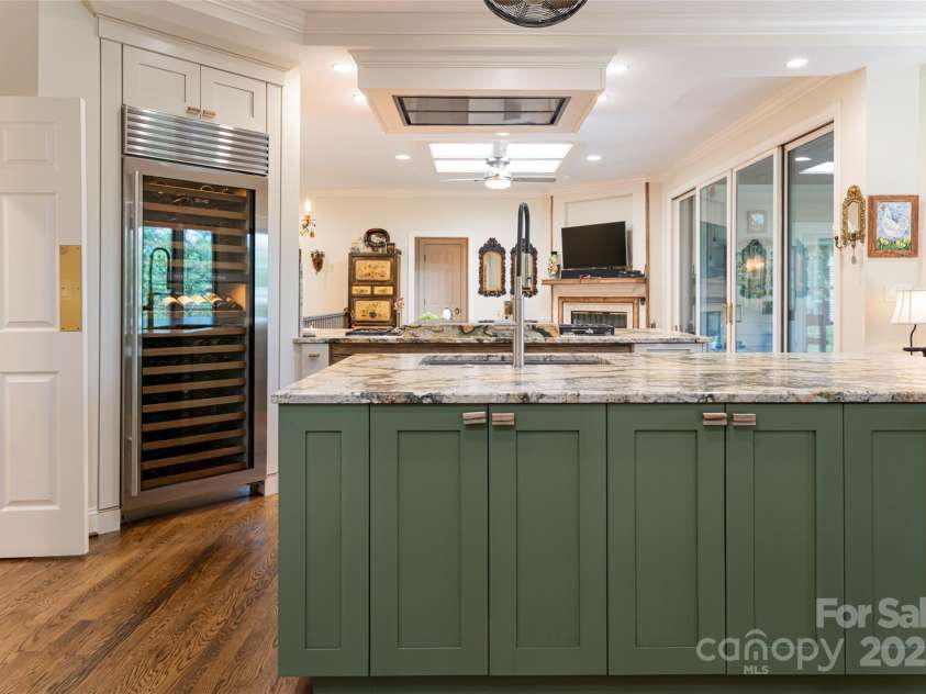 57 Old Hickory Trail, Hendersonville, NC 28739.  MLS# CAR4150896, YatesRealty ID 115. Sub-Zero Wine Tower and large center island