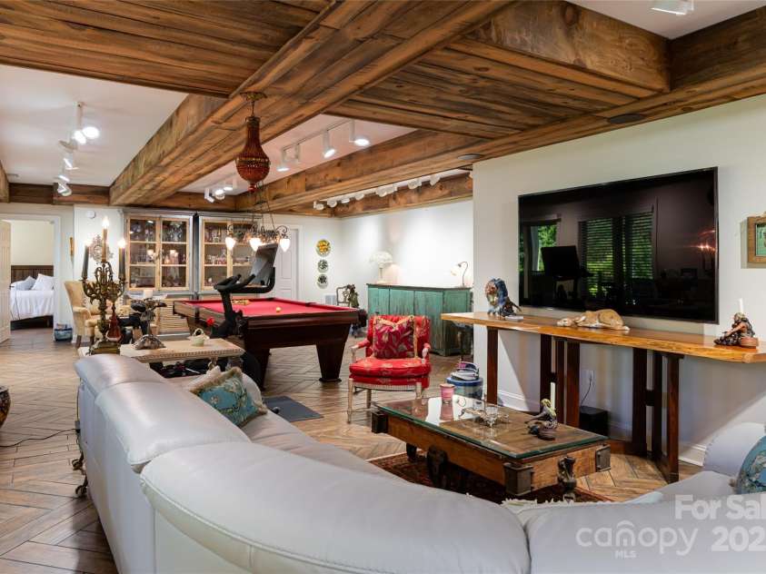 57 Old Hickory Trail, Hendersonville, NC 28739.  MLS# CAR4150896, YatesRealty ID 115. The large rec room sets up perfectly for a media area