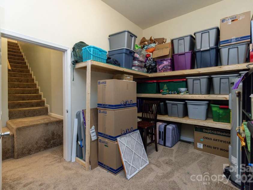 77 Stratford Place, Sylva, NC 28779.  MLS# CAR4219612, YatesRealty ID 11507. Additional storage room in basement