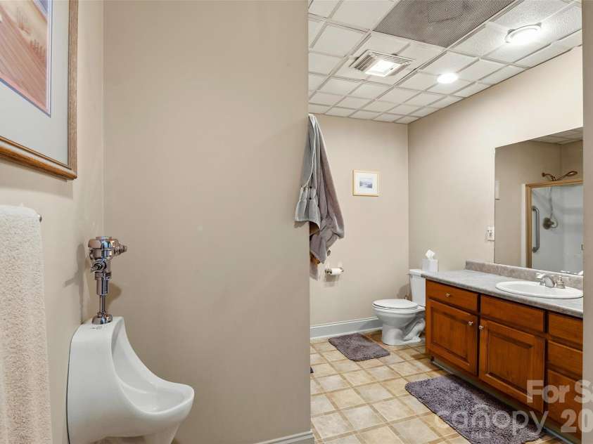 1244 Windover Drive, Brevard, NC 28712.  MLS# CAR4367852, YatesRealty ID 11508. Lower Level Bathroom
