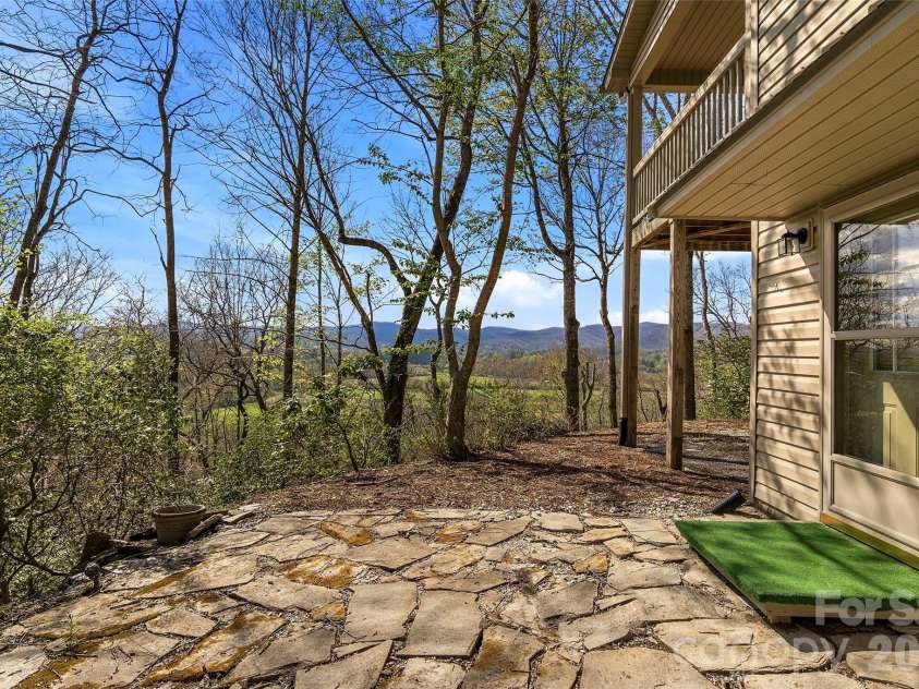 1244 Windover Drive, Brevard, NC 28712.  MLS# CAR4367852, YatesRealty ID 11508. Lower Level Walk Out from Bonus Room