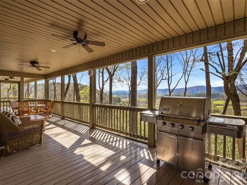 1244 Windover Drive, Brevard, NC 28712.  MLS# CAR4367852, YatesRealty ID 11508. Screened Porch