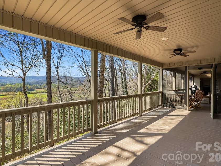 1244 Windover Drive, Brevard, NC 28712.  MLS# CAR4367852, YatesRealty ID 11508. Screened Porch