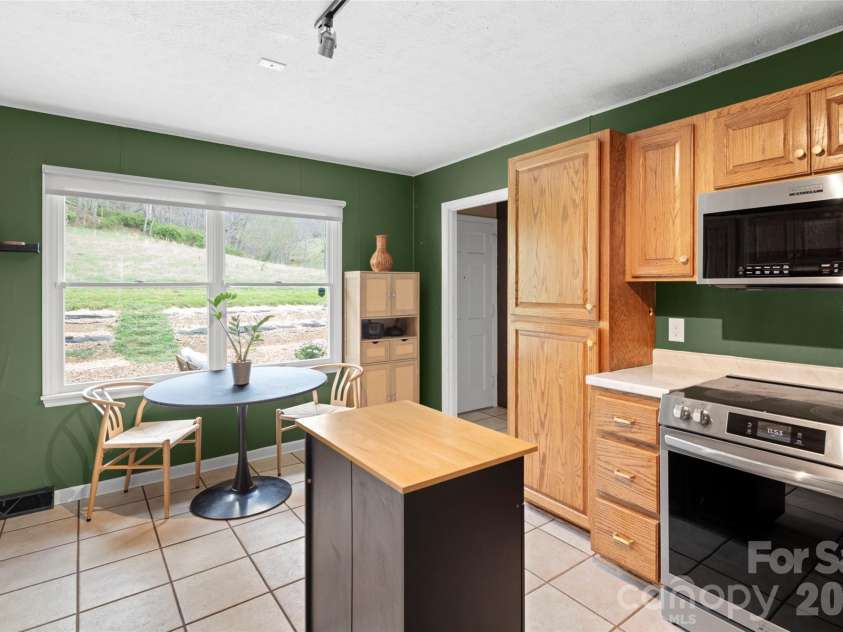 17 Boyd Cove Road, Leicester, NC 28748.  MLS# CAR4368244, YatesRealty ID 11509. Kitchen with new appliances. 