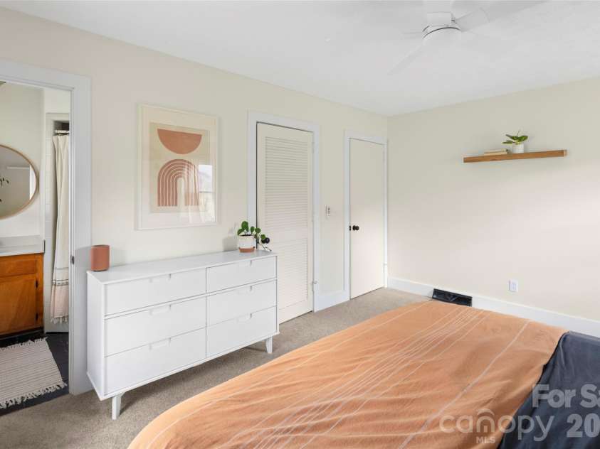 17 Boyd Cove Road, Leicester, NC 28748.  MLS# CAR4368244, YatesRealty ID 11509. Primary bedroom with ensuite
