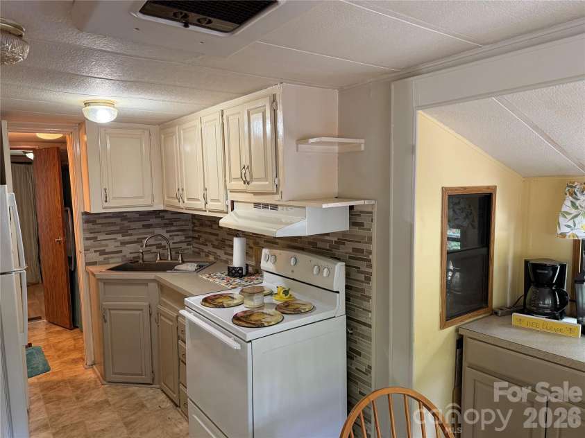 113/115 Indian Harbor Circle, Mount Gilead, NC 27306.  MLS# CAR4368100, YatesRealty ID 11510. 