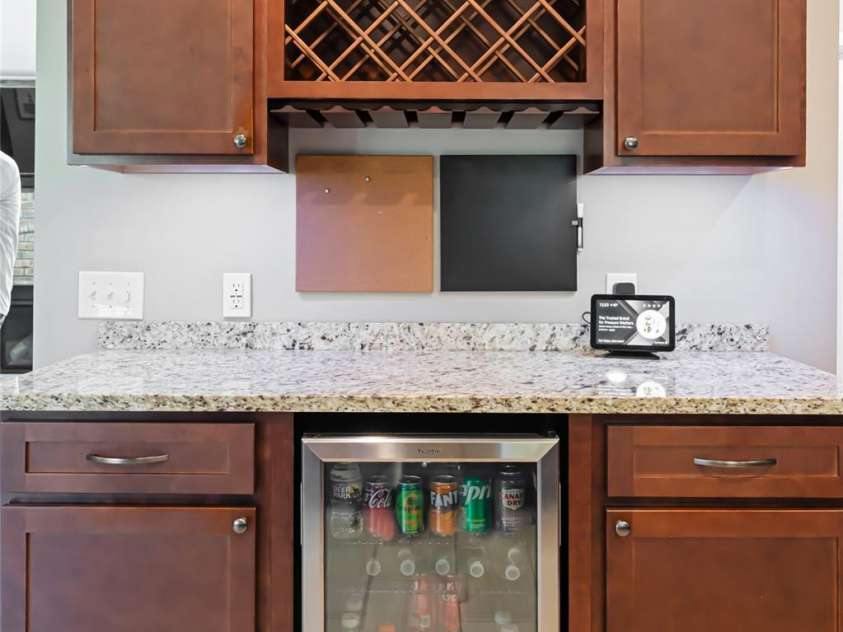 77 Roberts Ridge Drive, Etowah, NC 28729.  MLS# CAR4241039, YatesRealty ID 11510. Beverage fridge in kitchen