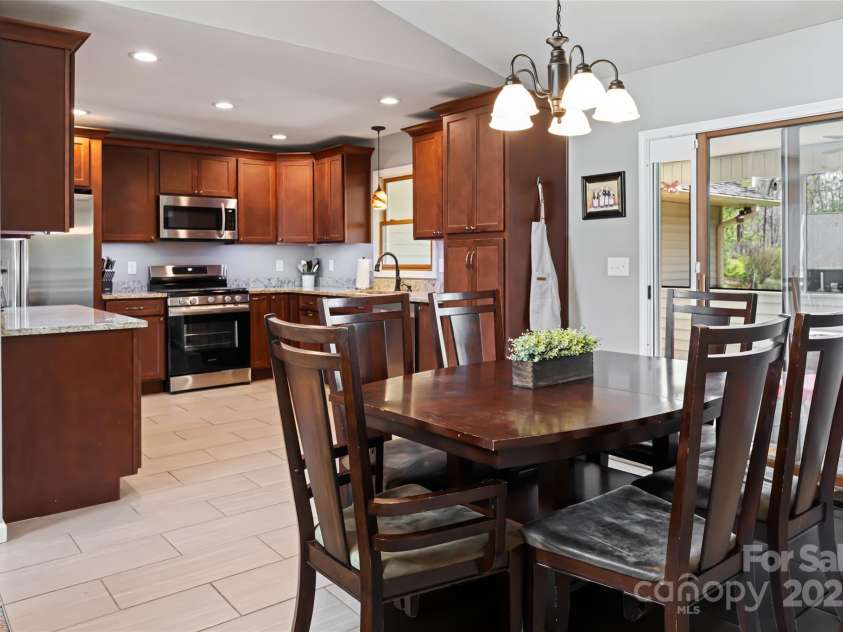 77 Roberts Ridge Drive, Etowah, NC 28729.  MLS# CAR4241039, YatesRealty ID 11510. Kitchen & dining area