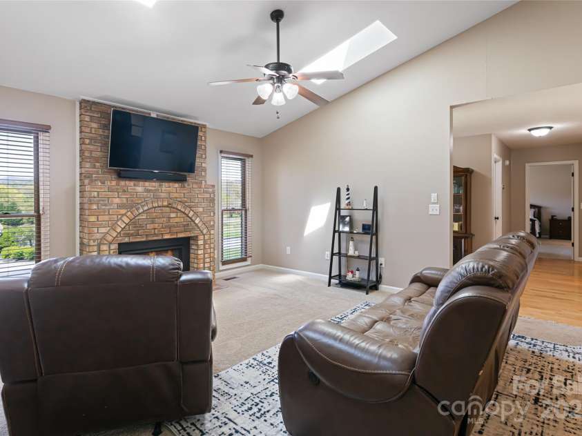 77 Roberts Ridge Drive, Etowah, NC 28729.  MLS# CAR4241039, YatesRealty ID 11510. Living room
