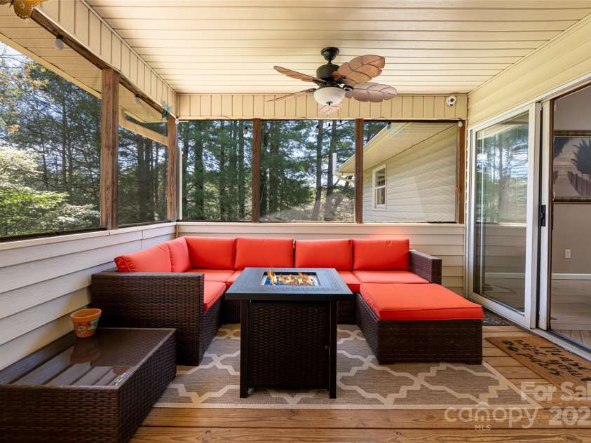 77 Roberts Ridge Drive, Etowah, NC 28729.  MLS# CAR4241039, YatesRealty ID 11510. Screened in back porch