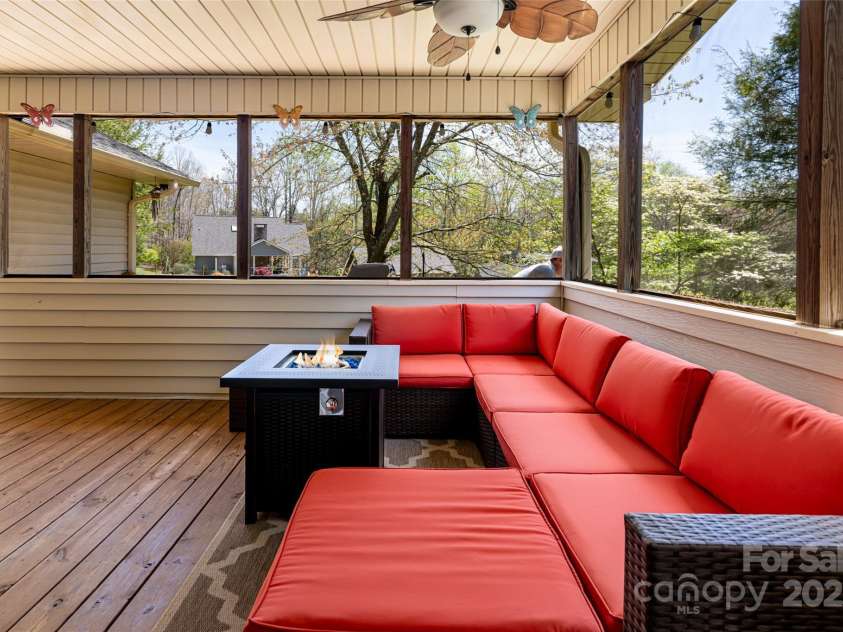 77 Roberts Ridge Drive, Etowah, NC 28729.  MLS# CAR4241039, YatesRealty ID 11510. Screened in back porch
