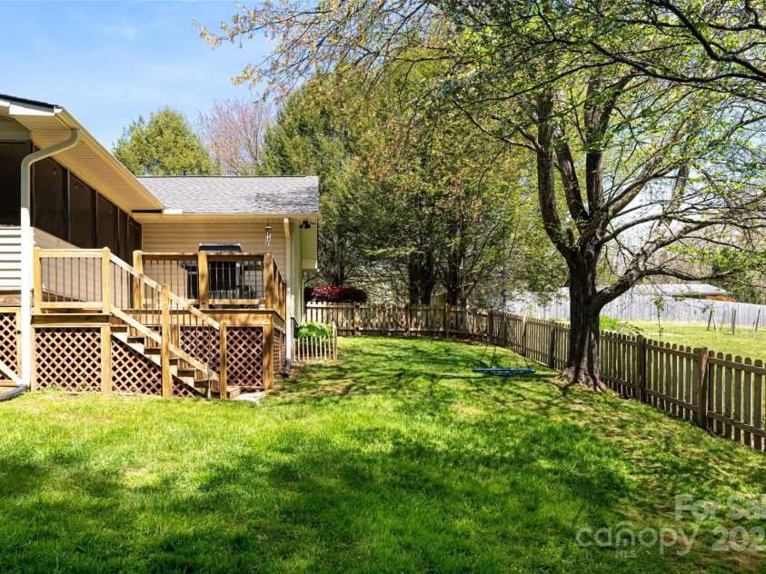 77 Roberts Ridge Drive, Etowah, NC 28729.  MLS# CAR4241039, YatesRealty ID 11510. Side/Rear view