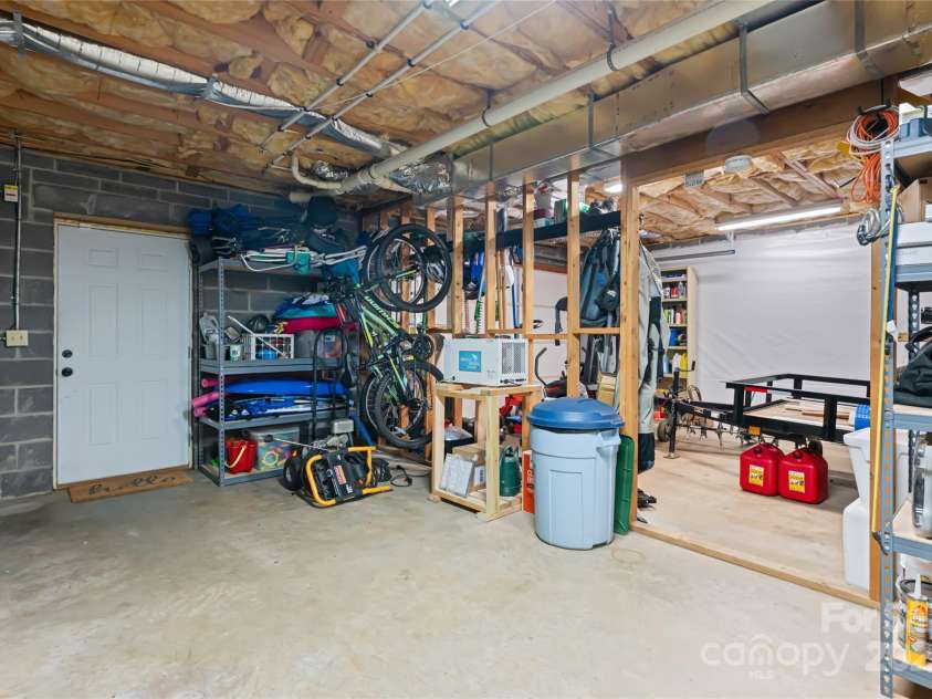 77 Roberts Ridge Drive, Etowah, NC 28729.  MLS# CAR4241039, YatesRealty ID 11510. Unfinished basement