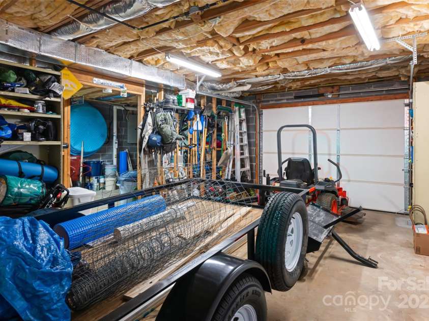 77 Roberts Ridge Drive, Etowah, NC 28729.  MLS# CAR4241039, YatesRealty ID 11510. Unfinished basement