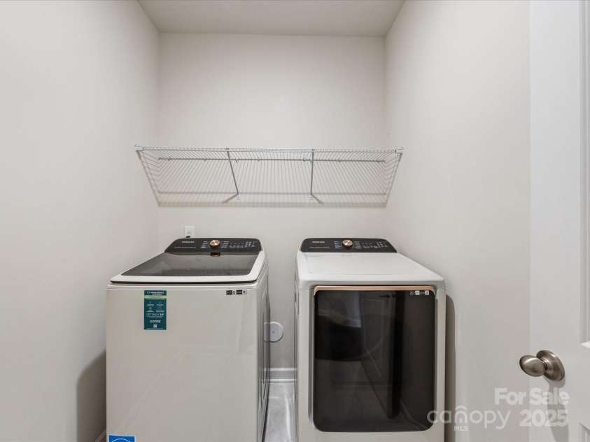 7642 Porrera Street, Charlotte, NC 28214.  MLS# CAR4249934, YatesRealty ID 11511. Laundry room