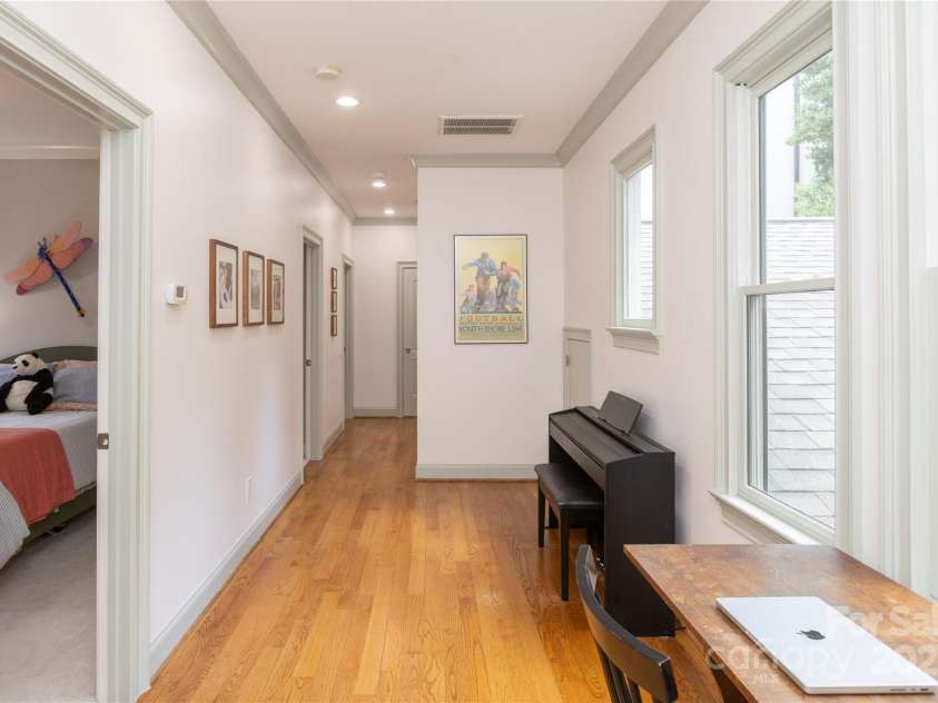 1517 Waverly Avenue, Charlotte, NC 28203.  MLS# CAR4252735, YatesRealty ID 11512. Wide upstairs hallway with bonus space