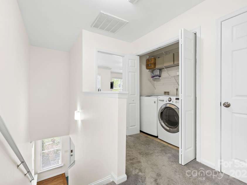 3414 Chagall Court, Charlotte, NC 28205.  MLS# CAR4242832, YatesRealty ID 11515. Upstairs Laundry Station