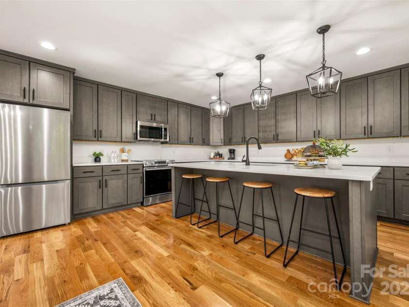 160 Lasae Lane, Tryon, NC 28782.  MLS# CAR4308669, YatesRealty ID 11520. Downstairs Kitchen
