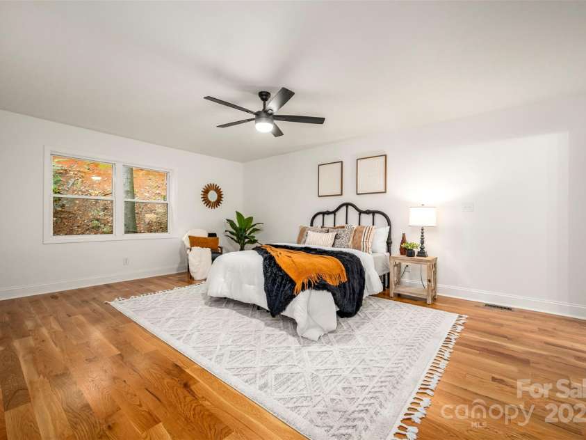 160 Lasae Lane, Tryon, NC 28782.  MLS# CAR4308669, YatesRealty ID 11520. Lower Level Primary Bedroom