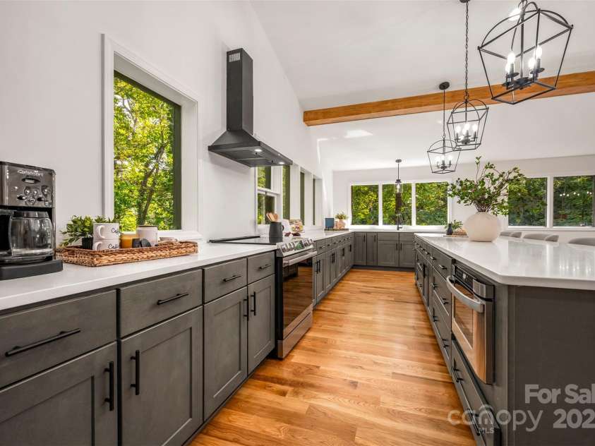 160 Lasae Lane, Tryon, NC 28782.  MLS# CAR4308669, YatesRealty ID 11520. Upstairs Kitchen
