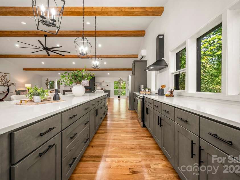 160 Lasae Lane, Tryon, NC 28782.  MLS# CAR4308669, YatesRealty ID 11520. Upstairs Kitchen