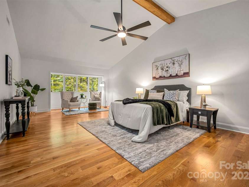 160 Lasae Lane, Tryon, NC 28782.  MLS# CAR4308669, YatesRealty ID 11520. Upstairs Primary Bedroom
