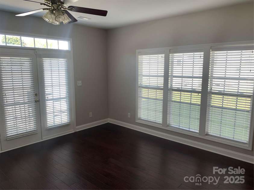 11622 Lioness Street, Charlotte, NC 28273.  MLS# CAR4254241, YatesRealty ID 11524. Another view of the great room with ceiling fan.