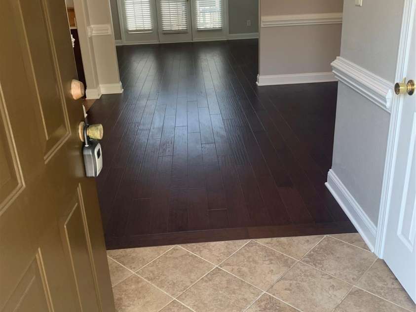11622 Lioness Street, Charlotte, NC 28273.  MLS# CAR4254241, YatesRealty ID 11524. Ceramic tile in foyer. 1/2 bath to the right. DR ahead and office to the left.