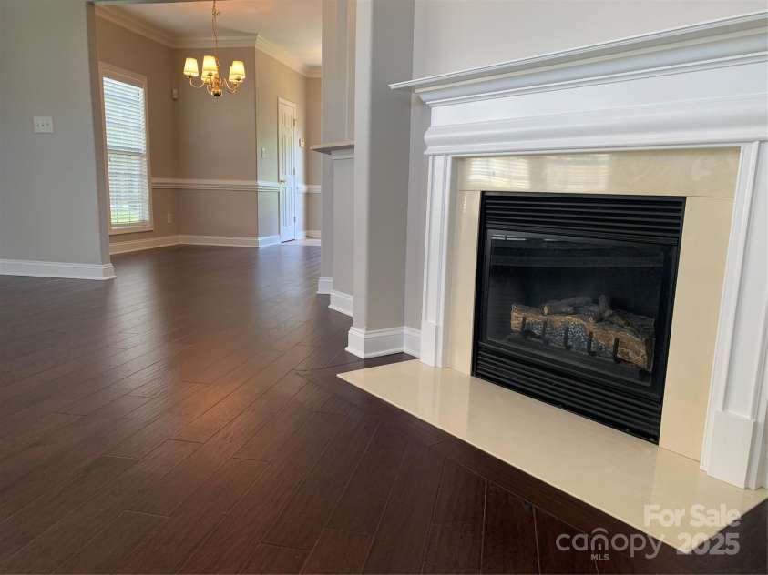11622 Lioness Street, Charlotte, NC 28273.  MLS# CAR4254241, YatesRealty ID 11524. Cozy up to the fireplace.