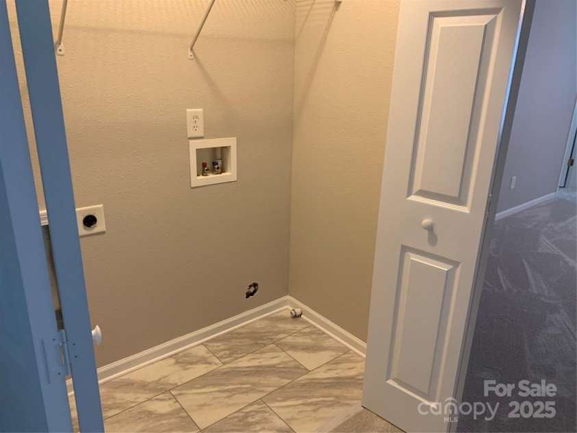 11622 Lioness Street, Charlotte, NC 28273.  MLS# CAR4254241, YatesRealty ID 11524. Laundry area features new flooring.