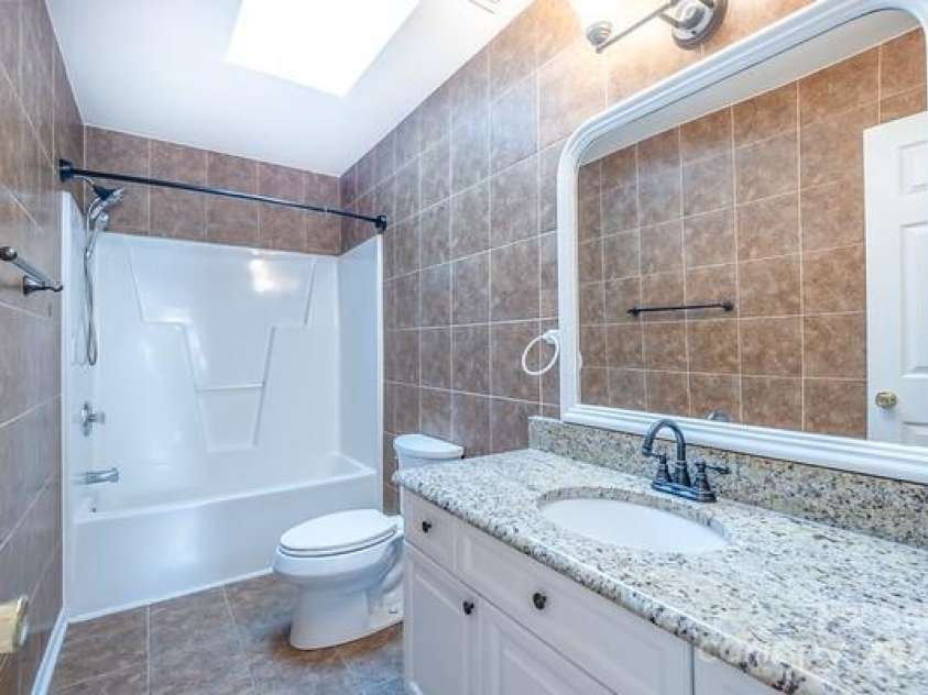 10146 Hawkeye Drive, Charlotte, NC 28273.  MLS# CAR4254398, YatesRealty ID 11525. Secondary bathroom