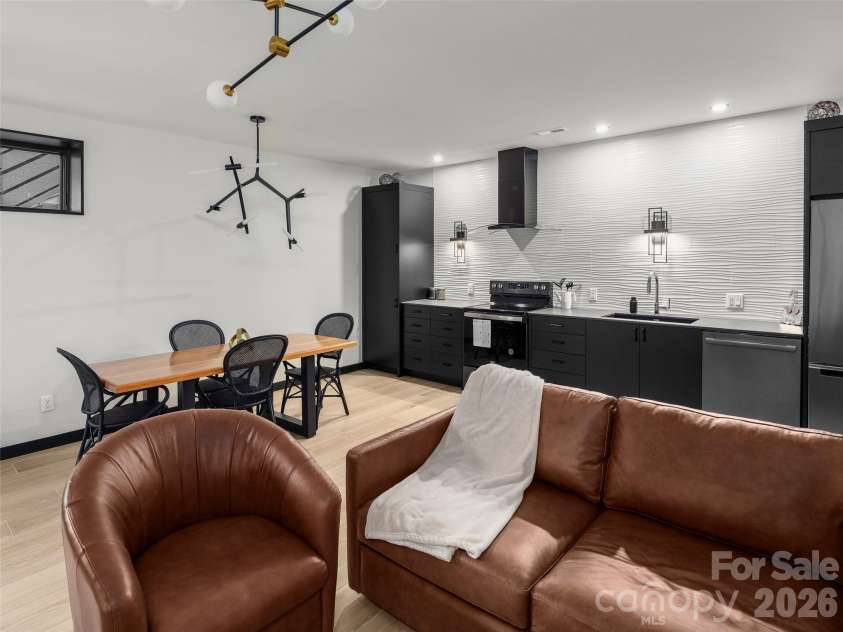 80 Hemlock Circle, Black Mountain, NC 28711.  MLS# CAR4367338, YatesRealty ID 11528. Downstairs Living Area