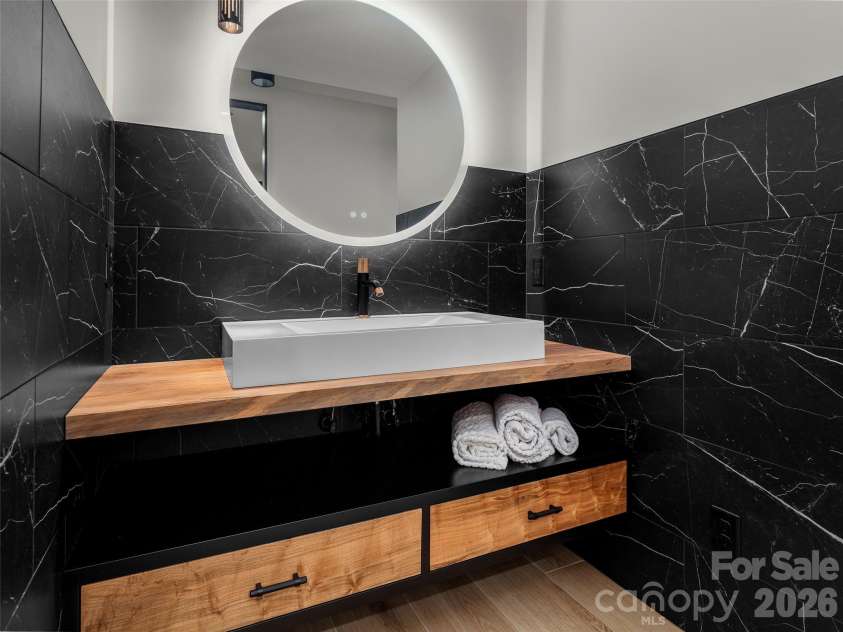 80 Hemlock Circle, Black Mountain, NC 28711.  MLS# CAR4367338, YatesRealty ID 11528. Downstairs sink and Vanity