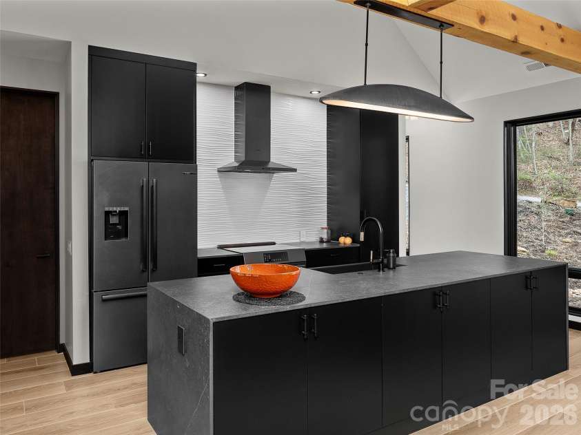 80 Hemlock Circle, Black Mountain, NC 28711.  MLS# CAR4367338, YatesRealty ID 11528. Modern Designed Kitchen with Dekton Countertops