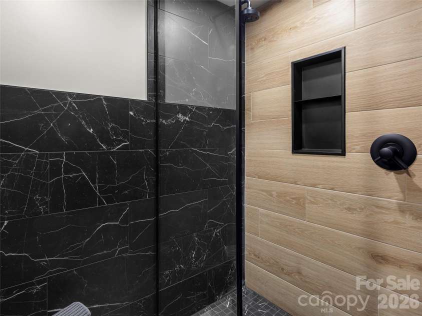 80 Hemlock Circle, Black Mountain, NC 28711.  MLS# CAR4367338, YatesRealty ID 11528. Zero Entry shower downstairs