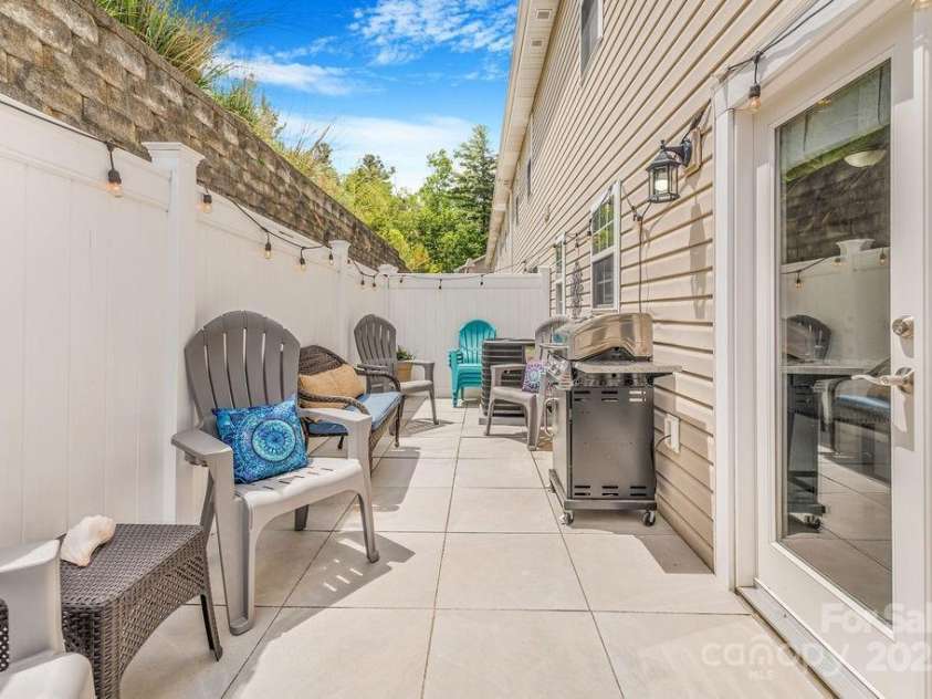 41 Lanceford Circle, Fletcher, NC 28732.  MLS# CAR4252559, YatesRealty ID 11531. Great outdoor patio space with concrete tile pavers